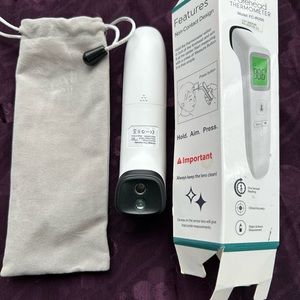 Forehead THERMOMETER Features Non-Contact Design/ Price dropped